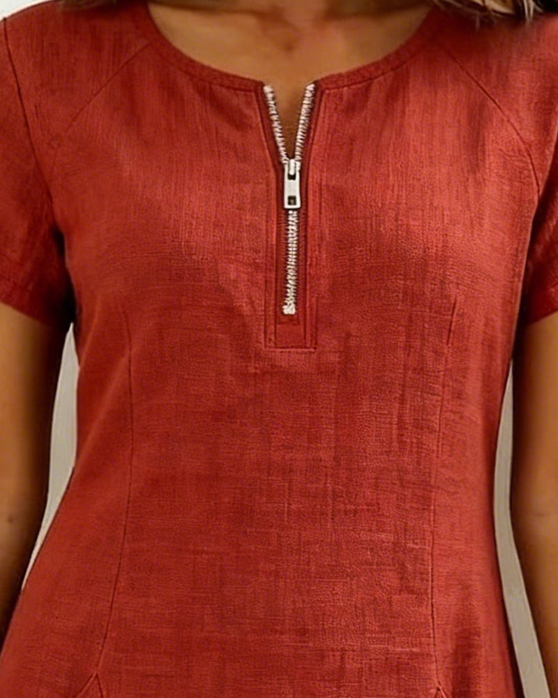 Vestido con cuello de cremallera y bolsillos Selloryta